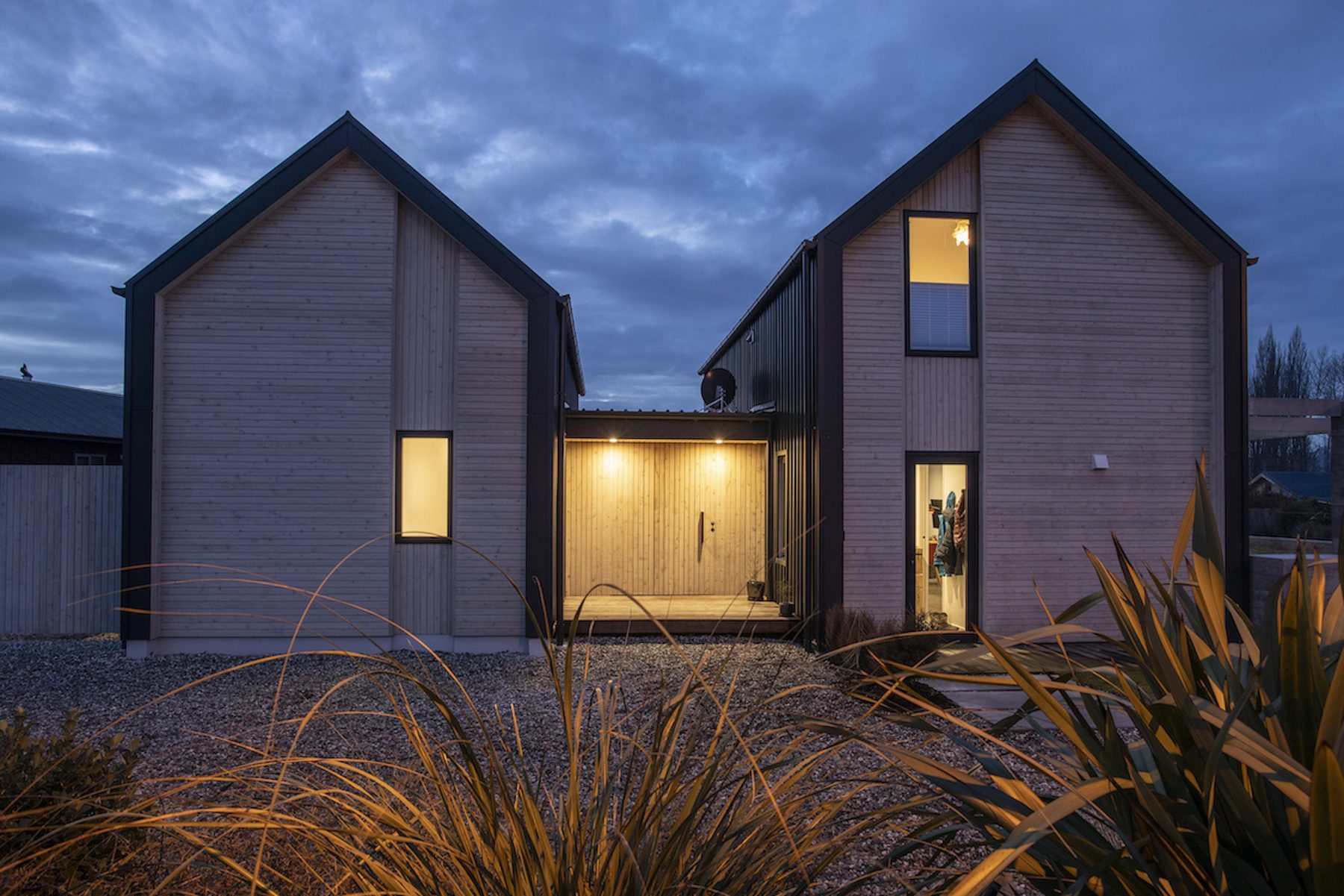 Smith House, twin gable exterior at dusk